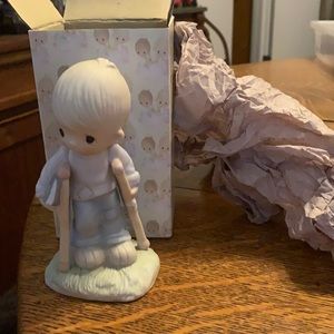 Precious Moments figurine ‘He watches over us all.’